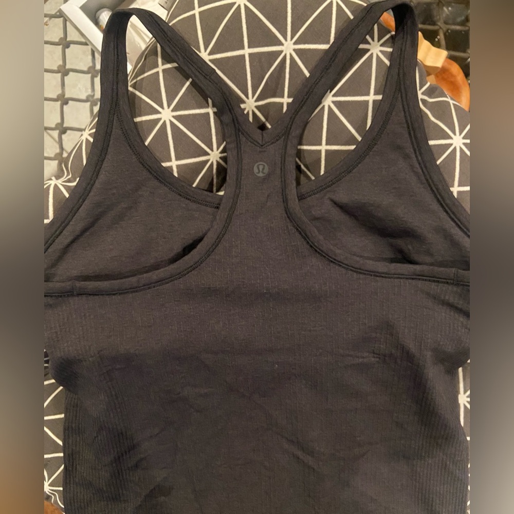 Lululemon Ebb To Street Built In Bra Racerback tank. Size 12. Ribbed. NWOT.